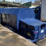 Caixa compactadora